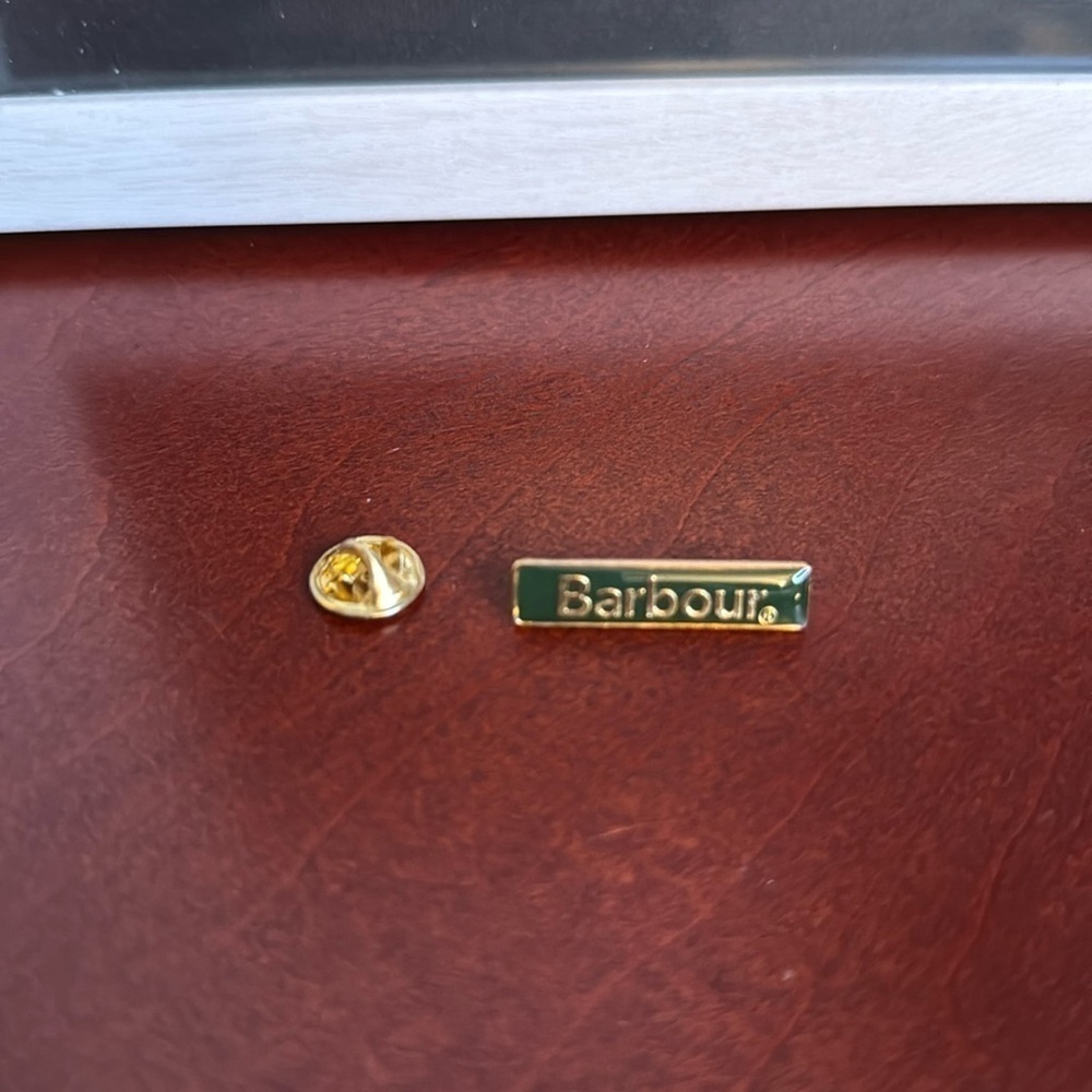 Barbour green and gold enamel pin